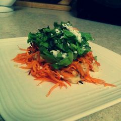 A picture of Quick yam noodles with "alfredo" sauce and greens.