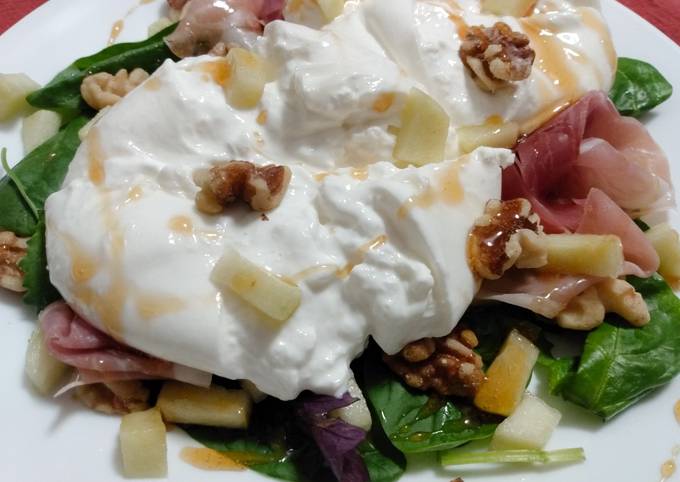 Burrata with prosciutto, honey-poached apple, and walnuts