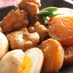A picture of Rich Simmered Chicken Wing Drumettes, Daikon Radish and Eggs.