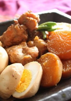 A picture of Rich Simmered Chicken Wing Drumettes, Daikon Radish and Eggs.