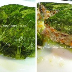 A picture of Ground Chicken Wrapped in Bok Choy.