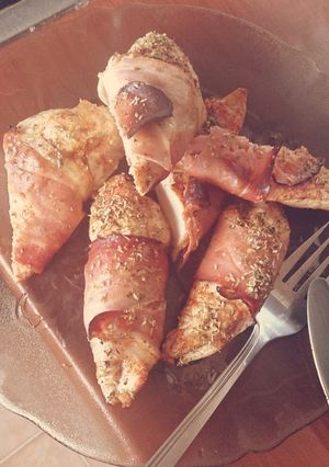 A picture of Smoked Chicken Wrapped In Ham.