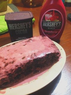 A picture of Choco-Berry Moist Cake With Strawberry Sauce.
