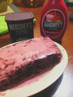 A picture of Choco-Berry Moist Cake With Strawberry Sauce.