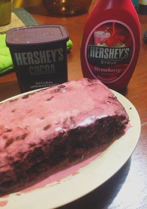 A picture of Choco-Berry Moist Cake With Strawberry Sauce.
