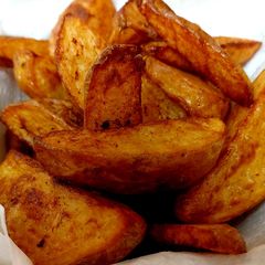 A picture of My homemade Deep fried Wedgie chunky Chips inthe Skin. #Sidedish.