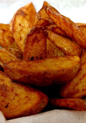 A picture of My homemade Deep fried Wedgie chunky Chips inthe Skin. #Sidedish.