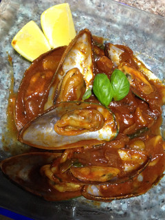 A picture of Mussels In Tomato Sauce.