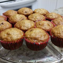A picture of Banana , chocolate chips and walnuts muffin.