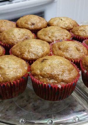 A picture of Banana , chocolate chips and walnuts muffin.
