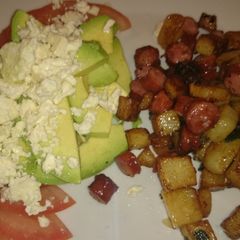 A picture of Diced potatoes and sausage.