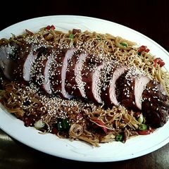 A picture of Asian Roasted Pork Tenderloin on Soba Noodles.
