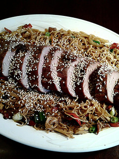 A picture of Asian Roasted Pork Tenderloin on Soba Noodles.