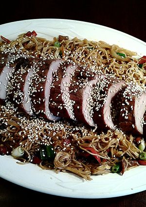 A picture of Asian Roasted Pork Tenderloin on Soba Noodles.