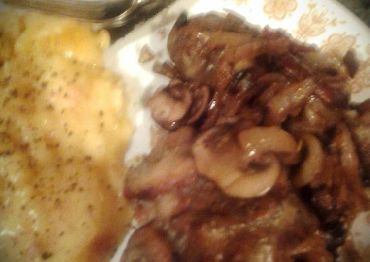 Smothered Chicken breast with onions and mushrooms & provolone cheese Smothered Chicken breast with onions and mushrooms & provolone cheese