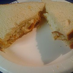 A picture of Leftover fish and coleslaw sandwiches.