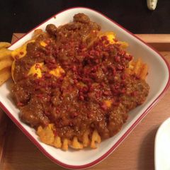 A picture of Layered Bacon Chili Cheddar Cheese Waffle Fries.