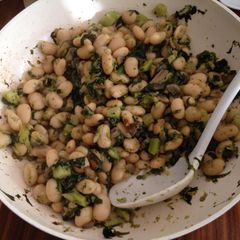 A picture of White Beans With Spinach And Mushrooms.