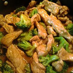 A picture of pork and broccoli.