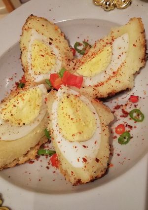 A picture of Potato Kibbeh with Eggs.