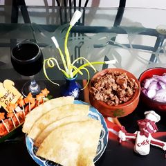 A picture of Handi kabab with fried paratha.