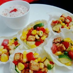 A picture of Cabbage Cups with chilli yogurt dip.