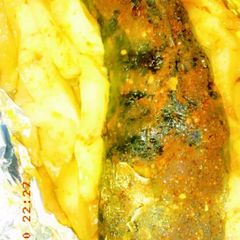 A picture of Grilled fish and potatoes.