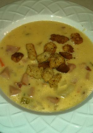 A picture of Cheesy Ham and Potato soup.