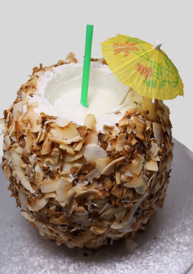 Una foto de Pastel "cóctel en coco" (sabor coco)
