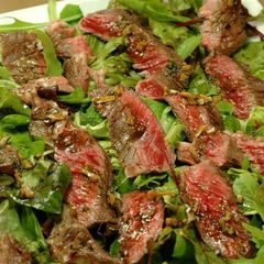 A picture of Tagliata (Thin Sliced) Beef Steak Salad.