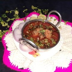 A picture of Chicken masala curry.