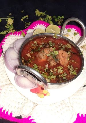A picture of Chicken masala curry.