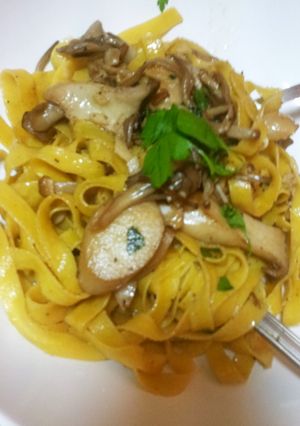 A picture of Butter Sautéed King Oyster Mushrooms on Fresh Fettuccine.