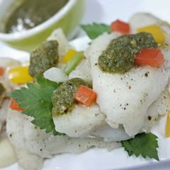 A picture of Poached fish with Lime and Cilantro.