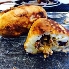 A picture of Papa Rellena (stuffed Potato- Peruvian Style).