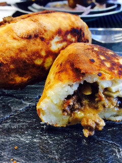 A picture of Papa Rellena (stuffed Potato- Peruvian Style).