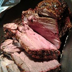 A picture of smoked leg of lamb.