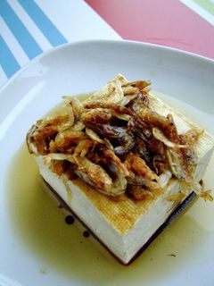 A picture of Chilled Tofu with Crispy Sakura Shrimp and Sizzling Sesame Oil.