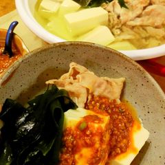 A picture of Boiled Tofu with Lots of Wakame with Korean Sauce.