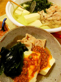 A picture of Boiled Tofu with Lots of Wakame with Korean Sauce.