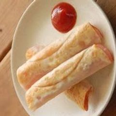 A picture of Pan-fried Gyoza with Rolled Ham and Cheese.