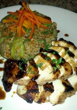 A picture of Teryaki Chicken with Stir-fry rice.