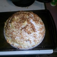 A picture of Guiltless coconut custard pie with sugar free meringue.