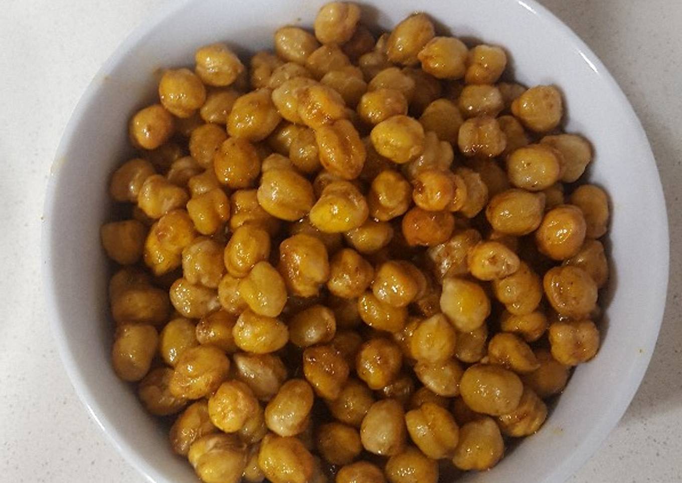 Garbanzos tostados con curry, comino y pimentón