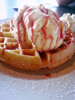 A picture of Berrilicous Waffles Topped with Icecream.