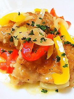 A picture of Chicken and Bell Peppers Simmer with Preserved Lemons & Dried Parsley.