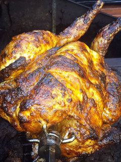 A picture of Spit Roasted chicken.