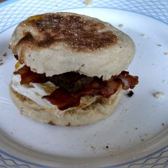 A picture of Delicious Egg Sandwich w/Bacon.