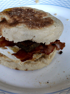 A picture of Delicious Egg Sandwich w/Bacon.