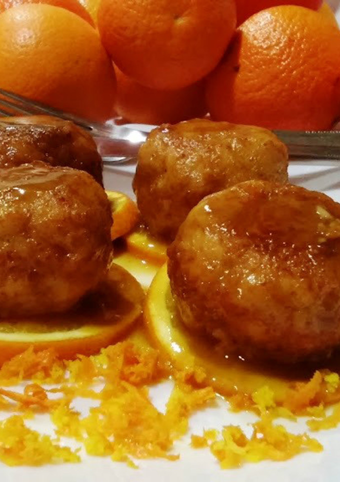 Una foto de Albóndigas de pollo y 4 quesos con naranja y salsa de mandarina